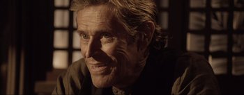 Movie still from “Dead for a Dollar” (2022), directed by Walter Hill – A person with long hair; Close Up shot, Over the shoulder angle