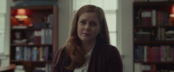 Movie still from “Dear Evan Hansen” (2021), directed by Stephen Chbosky – A person with long red hair; Close Up shot, Over the shoulder angle