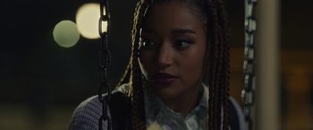 Movie still from “Dear Evan Hansen” (2021), directed by Stephen Chbosky – A person with long braids; Close Up shot, Over the shoulder angle