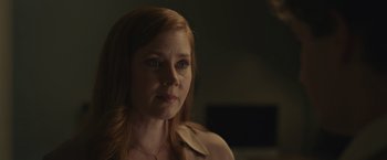 Movie still from “Dear Evan Hansen” (2021), directed by Stephen Chbosky – A person with long red hair; Close Up shot, Over the shoulder angle