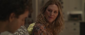 Movie still from “Dear Evan Hansen” (2021), directed by Stephen Chbosky – A person with curly hair; Close Up shot, Over the shoulder angle