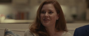 Movie still from “Dear Evan Hansen” (2021), directed by Stephen Chbosky – A person with long red hair; Close Up shot, Over the shoulder angle