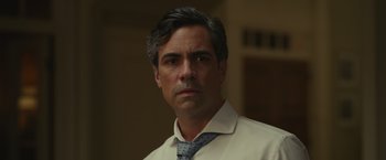 Movie still from “Dear Evan Hansen” (2021), directed by Stephen Chbosky – A person wearing a shirt and a tie; Close Up shot, Over the shoulder angle