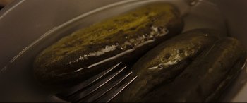 Movie still from “Two Lovers” (2008), directed by James Gray – A fork on a plate; Extreme Close Up shot, Overhead angle