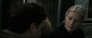 Movie still from “Two Lovers” (2008), directed by James Gray – A man and a woman are talking on a bus; Close Up shot, Over the shoulder angle