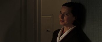 Movie still from “Two Lovers” (2008), directed by James Gray – A woman standing in front of a wall; Close Up shot, Over the shoulder angle