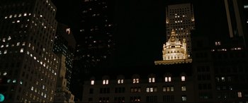 Movie still from “Two Lovers” (2008), directed by James Gray – A building that has been lit up at night; Extreme Wide shot, Low angle