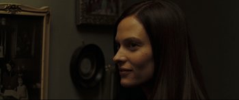 Movie still from “Two Lovers” (2008), directed by James Gray – A person with long brown hair; Close Up shot, Over the shoulder angle