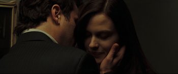 Movie still from “Two Lovers” (2008), directed by James Gray – A man and a woman embracing each other in the dark; Close Up shot, Low angle