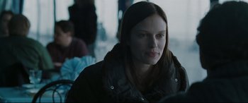 Movie still from “Two Lovers” (2008), directed by James Gray – A person sitting in a room; Close Up shot, Over the shoulder angle