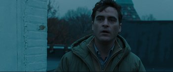 Movie still from “Two Lovers” (2008), directed by James Gray – A person wearing a jacket; Close Up shot, Over the shoulder angle