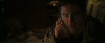 Movie still from “Two Lovers” (2008), directed by James Gray – A person talking on a cell phone; Close Up shot, Over the shoulder angle
