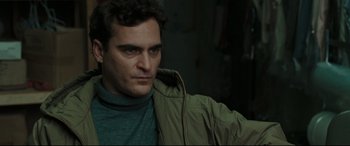 Movie still from “Two Lovers” (2008), directed by James Gray – A person wearing a jacket; Close Up shot, Over the shoulder angle