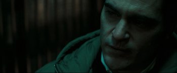 Movie still from “Two Lovers” (2008), directed by James Gray – A person wearing a jacket; Close Up shot, Over the shoulder angle