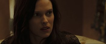 Movie still from “Two Lovers” (2008), directed by James Gray – A person with long dark hair; Close Up shot, Over the shoulder angle