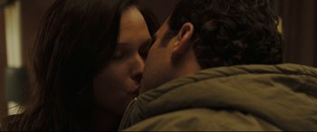Movie still from “Two Lovers” (2008), directed by James Gray – A man and a woman are kissing in a room; Close Up shot, Low angle