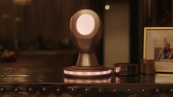 Movie still from “Deborah” (2022), directed by Noga Pnueli – A lamp that is on top of a table; Extreme Close Up shot, Low angle