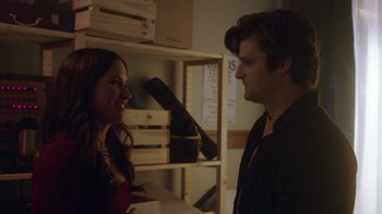 Movie still from “Deborah” (2022), directed by Noga Pnueli – A man and a woman are talking in a room; Close Up shot, Over the shoulder angle