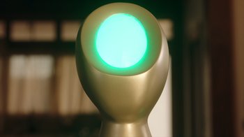 Movie still from “Deborah” (2022), directed by Noga Pnueli – A green light on a lamp post; Extreme Close Up shot, Low angle