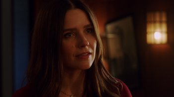 Movie still from “Deborah” (2022), directed by Noga Pnueli – A person with long brown hair; Close Up shot, Over the shoulder angle