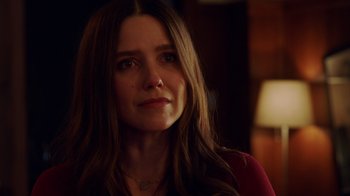 Movie still from “Deborah” (2022), directed by Noga Pnueli – A person with long brown hair; Close Up shot, Over the shoulder angle