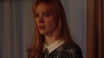 Movie still from “Deborah” (2022), directed by Noga Pnueli – A person with long blonde hair; Close Up shot, Over the shoulder angle