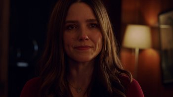 Movie still from “Deborah” (2022), directed by Noga Pnueli – A person with long brown hair; Close Up shot, Over the shoulder angle