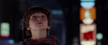 Movie still from “Deep Impact” (1998), directed by Mimi Leder – A young boy looking up into the air; Close Up shot, Low angle