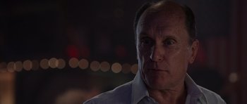 Movie still from “Deep Impact” (1998), directed by Mimi Leder – An older man is looking into the camera; Close Up shot, Over the shoulder angle