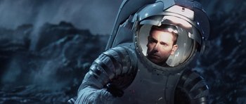 Movie still from “Deep Impact” (1998), directed by Mimi Leder – An image of a man in a spacesuit; Close Up shot, Low angle