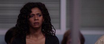 Movie still from “Deep Impact” (1998), directed by Mimi Leder – A person with long curly hair; Close Up shot, Over the shoulder angle