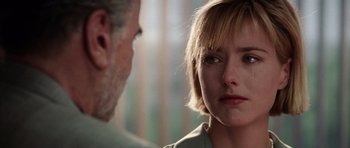 Movie still from “Deep Impact” (1998), directed by Mimi Leder – A man and a woman looking at one another; Close Up shot, Over the shoulder angle