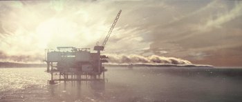 Movie still from “Deep Impact” (1998), directed by Mimi Leder – An oil platform in the middle of the ocean; Extreme Wide shot, Low angle