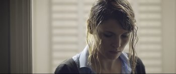 Movie still from “Upstream Color” (2013), directed by Shane Carruth – A person with long hair; Close Up shot, Low angle