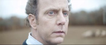 Movie still from “Upstream Color” (2013), directed by Shane Carruth – A person with blue eyes; Close Up shot, Low angle