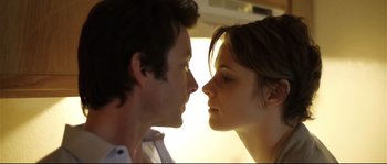 Movie still from “Upstream Color” (2013), directed by Shane Carruth – A man and a woman face to face in front of a window; Close Up shot, Low angle