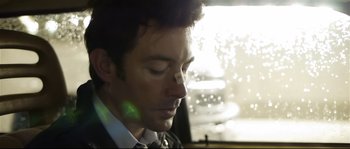 Movie still from “Upstream Color” (2013), directed by Shane Carruth – A person with his eyes closed; Close Up shot, Low angle