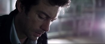 Movie still from “Upstream Color” (2013), directed by Shane Carruth – A man's face with his eyes closed; Close Up shot, Low angle
