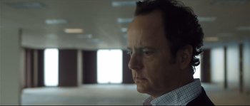 Movie still from “Upstream Color” (2013), directed by Shane Carruth – A person in a room; Close Up shot, Low angle