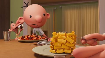 Movie still from “Diary of a Wimpy Kid” (2021), directed by Gino Nichele – A cartoon of a man and a bunch of food on a table; Medium shot, Over the shoulder angle