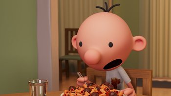Movie still from “Diary of a Wimpy Kid” (2021), directed by Gino Nichele – A cartoon of a boy with a plate of food; Medium shot, Overhead angle
