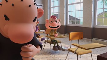 Movie still from “Diary of a Wimpy Kid” (2021), directed by Gino Nichele – A scene of a cartoon character sitting at a table; Wide shot, Over the shoulder angle