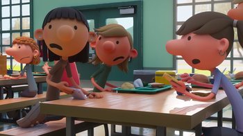 Movie still from “Diary of a Wimpy Kid” (2021), directed by Gino Nichele – A group of people sitting at a table; Medium shot, Over the shoulder angle