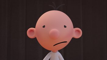 Movie still from “Diary of a Wimpy Kid” (2021), directed by Gino Nichele – A cartoon character with a frowning look on his face; Close Up shot, Low angle