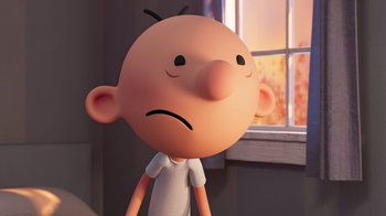Movie still from “Diary of a Wimpy Kid” (2021), directed by Gino Nichele – A cartoon character with a sad look on his face; Close Up shot, Low angle