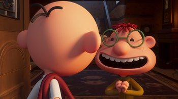 Movie still from “Diary of a Wimpy Kid” (2021), directed by Gino Nichele – Two cartoon characters one of which has glasses on the other; Close Up shot, Over the shoulder angle