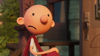 Movie still from “Diary of a Wimpy Kid” (2021), directed by Gino Nichele – A cartoon character with a frowning look on his face; Close Up shot, Low angle