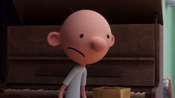 Movie still from “Diary of a Wimpy Kid” (2021), directed by Gino Nichele – A cartoon character with a sad look on his face; Medium shot, High angle