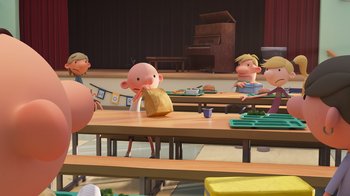 Movie still from “Diary of a Wimpy Kid” (2021), directed by Gino Nichele – A group of people sitting at tables in a classroom; Wide shot, Over the shoulder angle