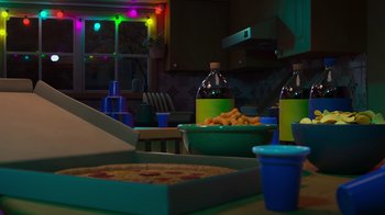 Movie still from “Diary of a Wimpy Kid: Rodrick Rules” (2022), directed by Gino Nichele – A table with a pizza and a bowl of macaroni and cheese; Extreme Wide shot, High angle